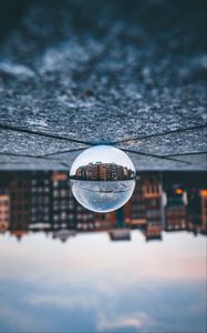 Preview wallpaper ball, glass, reflection, building, blur