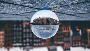 Preview wallpaper ball, glass, reflection, building, blur