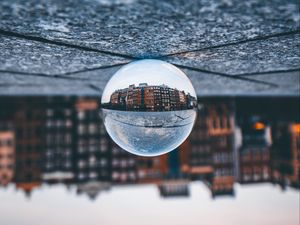 Preview wallpaper ball, glass, reflection, building, blur