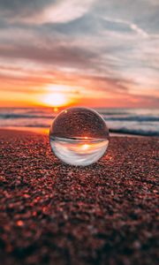 Preview wallpaper ball, glass, reflection, sea, sunset, shore