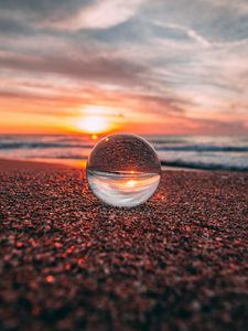 Preview wallpaper ball, glass, reflection, sea, sunset, shore