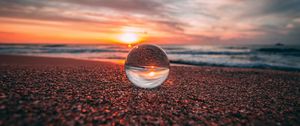 Preview wallpaper ball, glass, reflection, sea, sunset, shore