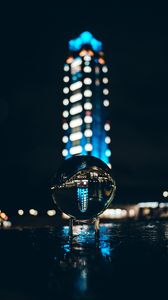 Preview wallpaper ball, glass, reflection, glare, bokeh, night