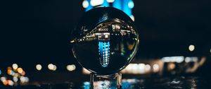 Preview wallpaper ball, glass, reflection, glare, bokeh, night