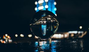 Preview wallpaper ball, glass, reflection, glare, bokeh, night