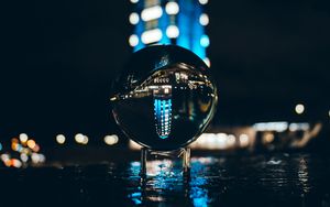 Preview wallpaper ball, glass, reflection, glare, bokeh, night