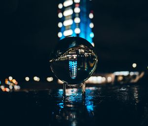 Preview wallpaper ball, glass, reflection, glare, bokeh, night