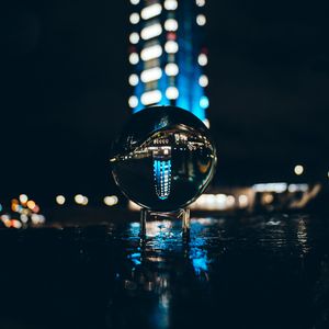 Preview wallpaper ball, glass, reflection, glare, bokeh, night