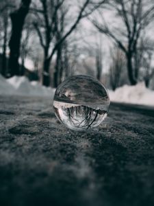 Preview wallpaper ball, glass, reflection, macro, blur, snow, trees