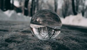 Preview wallpaper ball, glass, reflection, macro, blur, snow, trees