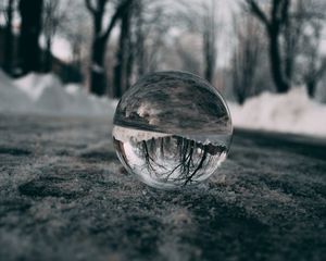 Preview wallpaper ball, glass, reflection, macro, blur, snow, trees