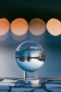 Preview wallpaper ball, glass, reflection, sphere, blur, bokeh