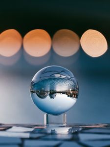 Preview wallpaper ball, glass, reflection, sphere, blur, bokeh