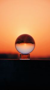 Preview wallpaper ball, glass, sunset, reflection, sky, macro