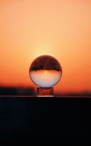 Preview wallpaper ball, glass, sunset, reflection, sky, macro