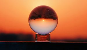 Preview wallpaper ball, glass, sunset, reflection, sky, macro