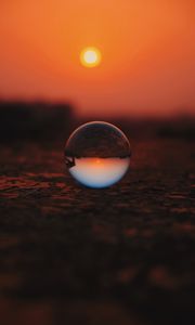 Preview wallpaper ball, glass, sunset, transparent, reflection, macro