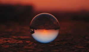 Preview wallpaper ball, glass, sunset, transparent, reflection, macro