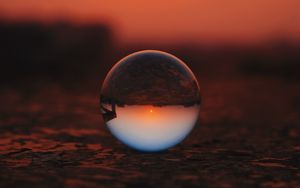 Preview wallpaper ball, glass, sunset, transparent, reflection, macro