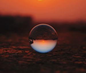 Preview wallpaper ball, glass, sunset, transparent, reflection, macro