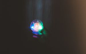 Preview wallpaper ball, glow, hand, dark