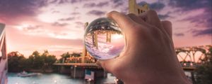 Preview wallpaper ball, hand, bridge, city