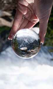 Preview wallpaper ball, reflection, mountains, nature, hand