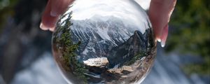 Preview wallpaper ball, reflection, mountains, nature, hand