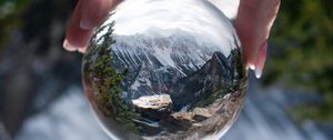 Preview wallpaper ball, reflection, mountains, nature, hand