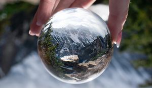 Preview wallpaper ball, reflection, mountains, nature, hand