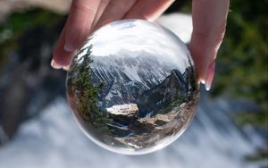 Preview wallpaper ball, reflection, mountains, nature, hand