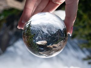 Preview wallpaper ball, reflection, mountains, nature, hand