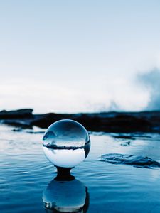 Preview wallpaper ball, reflection, water, ripples