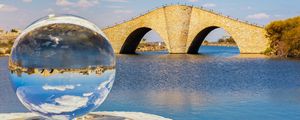 Preview wallpaper ball, river, bridge, clouds, reflection