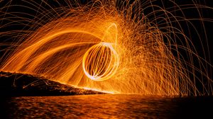 Preview wallpaper ball, sparks, freezelight, glow, water
