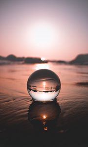 Preview wallpaper ball, water, reflection, distortion, focus