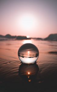 Preview wallpaper ball, water, reflection, distortion, focus