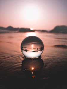 Preview wallpaper ball, water, reflection, distortion, focus