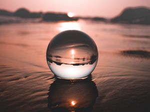 Preview wallpaper ball, water, reflection, distortion, focus