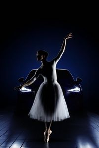 Preview wallpaper ballerina, car, girl, lights, jaguar