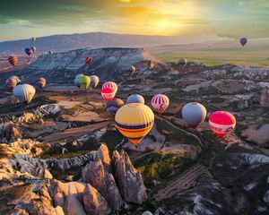 Preview wallpaper balloon, balloons, multicolored, rocks