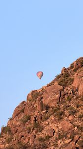 Preview wallpaper balloon, rock, mountains, sky