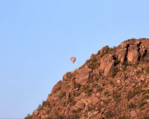 Preview wallpaper balloon, rock, mountains, sky