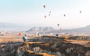 Preview wallpaper balloons, colorful, mountains, rocks, valley