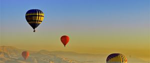 Preview wallpaper balloons, sky, hills
