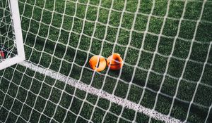 Preview wallpaper balls, football, netting, gate, football field