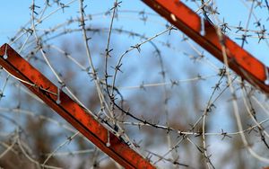 Preview wallpaper barbed wire, stretched, metal, rust, paint, sky