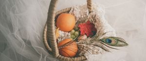 Preview wallpaper basket, fruit, leaves, feather