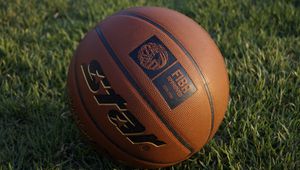 Preview wallpaper basketball ball, basketball, ball, grass