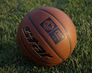 Preview wallpaper basketball ball, basketball, ball, grass